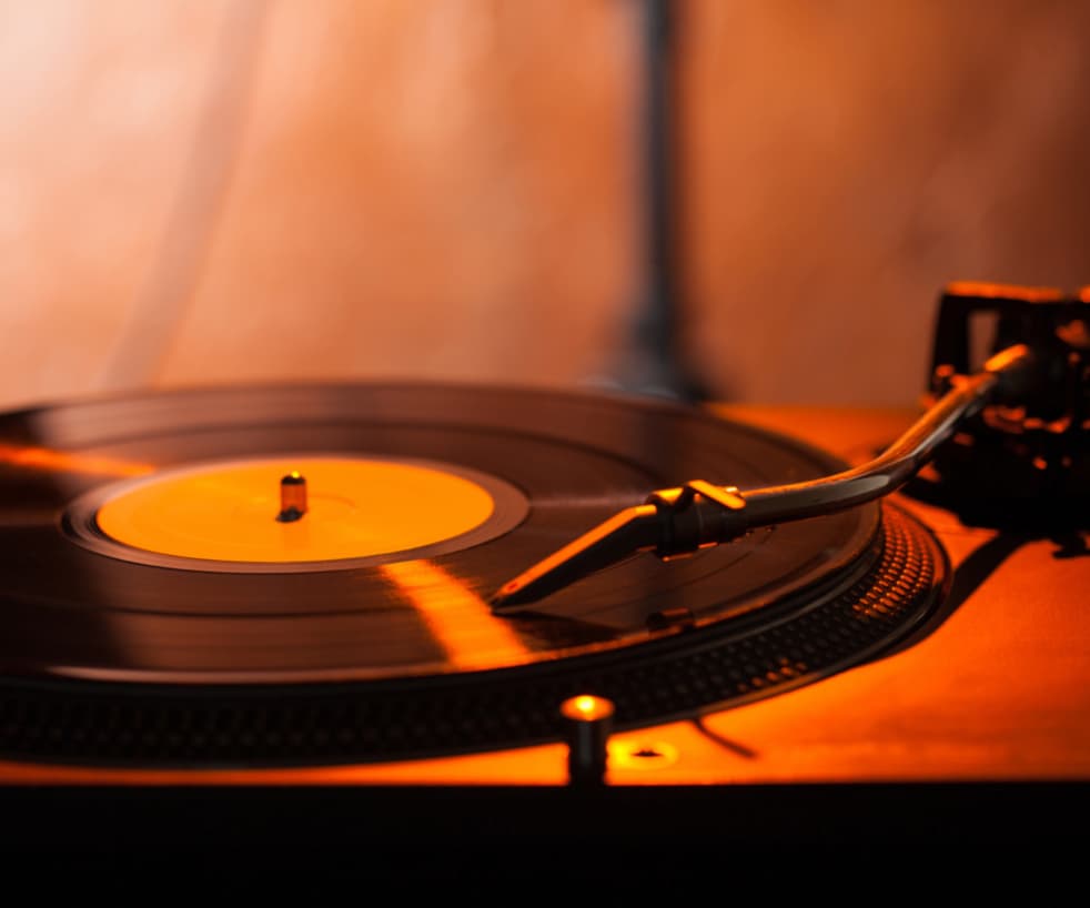 A vinyl being played. 